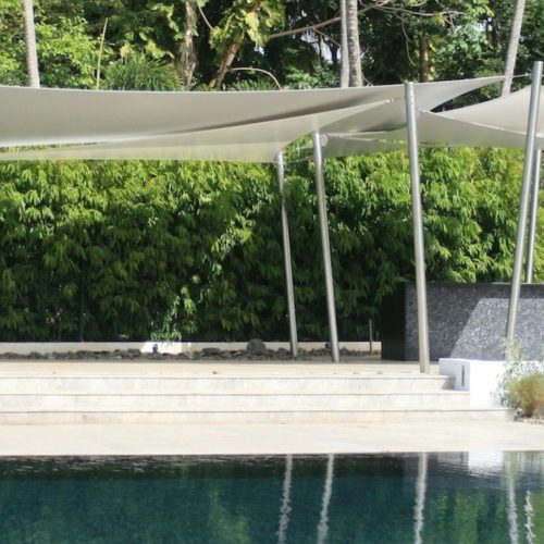 Outdoor shades custom upholstery and shade structures in San Juan, PR: shade sails, tension systems, and outdoor curtains by Sand Sea and Air. Style, comfort, and sun protection.